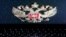 The coat of arms of Russia is reflected in a laptop screen in this picture illustration taken Feb. 12, 2019. 