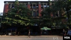 ຕຶກເກົ່າແກ່ອັນງົດງາມຫຼັງນີ້ ມີອາຍຸເກືອບນຶ່ງຮ້ອຍປີ ຢູ່ໃນຢ່າງກຸ້ງ ຫົວເມືອງໃຫຍ່ສຸດຂອງມຽນມາ.