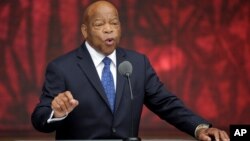 U.S. Rep. John Lewis, D-Georgia, speaks at the dedication of the Smithsonian’s National Museum of African American History and Culture in Washington, D.C., Sept. 24, 2016. Lewis won a National Book Award for a graphic novel about his civil rights activism.