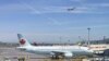 Air Canada Lays Off 5,000, France Tries to Save Food Supply 