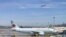 An Air Canada plane sits on the tarmac at Trudeau airport near Montreal, Canada. 