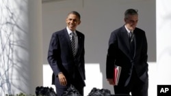 President Barack Obama with White House Chief of Staff Denis McDonough, West Wing Colonnade of the White House, Washington, Feb. 12, 2013.