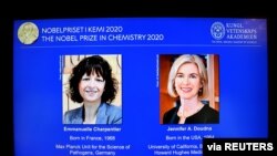 Pictures of Emmanuelle Charpentier and Jennifer A. Doudna, winners of the 2020 Nobel Prize in Chemistry, are displayed on a screen during the news conference, in Stockholm, Sweden, Oct, 7, 2020. (TT News Agency/Henrik Montgomery/Pool via Reuters)
