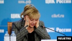 Ella Pamfilova, head of the Central Election Commission, reacts as she addresses the media after poll close in the Russian parliamentary election, at the commission's headquarters in Moscow, Sept. 19, 2021. 