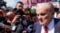 FILE - Rudy Giuliani speaks in Atlanta, Georgia, on Aug. 23, 2023. A federal judge on Aug. 30, 2023, entered a default judgment against Giuliani in a defamation lawsuit brought by two election workers in Georgia.