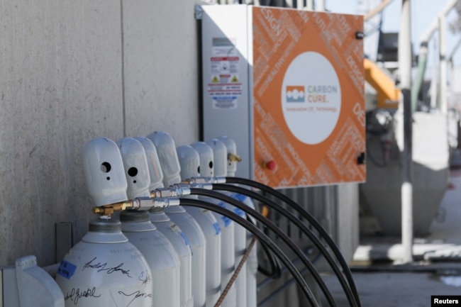 Tanks containing captured carbon dioxide are seen near a CarbonCure reclaimer unit that controls the flow of CO2 in San Jose, California, U.S. February 1, 2023. (REUTERS/Nathan Frandino)