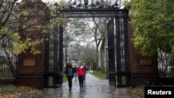 Students walk on the campus of Yale University in New Haven, Connecticut, Nov. 12, 2015. 