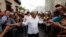 FILE - Mexico's President-elect Andres Manuel Lopez Obrador greets supporters in Mazatlan, Mexico, Sept. 16, 2018. Lopez Obrador's approval rate has grown in his first three months in office.