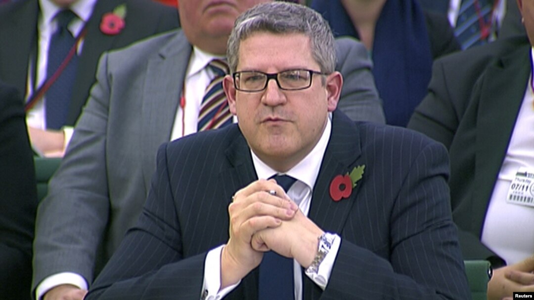 FILE - Andrew Parker, head of M15, is seen attending an Intelligence and Security Committee hearing at Parliament, in this still image taken from video in London, Nov. 7, 2013. 