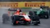 Marussia driver Jules Bianchi of France leads Caterham driver Kamui Kobayashi of Japan during the Japanese Formula One Grand Prix at the Suzuka Circuit in Suzuka, central Japan, Sunday, Oct. 5, 2014.