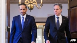 آنتونی جی. بلینکن، وزیر امور خارجه آمریکا و محمد بن عبدالرحمن آل ثانی، نخست‌وزیر و وزیر امور خارجه قطر.