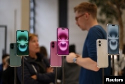 FILE - Apple iPhone 16 smartphones are displayed at a store in London, Britain, October 6, 2024. (REUTERS/Hollie Adams)