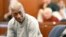 FILE - Plaintiff Dewayne Johnson reacts after hearing the verdict in his case against Monsanto at the Superior Court of California in San Francisco, Aug. 10, 2018.