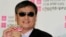 Chinese activist Chen Guangcheng listens to a reporter's question during a press conference at the Taiwan Association for China Human Rights building in Taipei, Taiwan, June 24, 2013. 