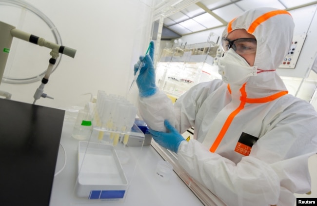 Geoscientist Jeremy McCormack is seen researching zinc from shark teeth in a metal-free clean laboratory at the Max Planck Institute for Evolutionary Anthropology in Leipzig, Germany in this undated image. (Max Planck Institute for Evolutionary Anthropology/Handout via REUTERS)