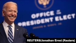 USA, Delaware, Wilmington, U.S. President-elect Joe Biden smiles as he speaks about health care and the Affordable Care Act