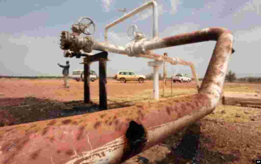 &ldquo;I will only believe the resumption of oil production when I see the oil flowing... There have been so many dishonored agreements since 1921. God bless [Sudanese] President Bashir and his party... for choosing to cooperate with South Sudan.&quot;&nbsp; Akeen Nyanut Oil spills onto the ground from a wellhead strafed by shrapnel from a bomb dropped by fighter jets at the El Nar oil field in South Sudan&#39;s Unity State, March 3, 2012.