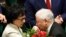 Leader of Poland's ruling right-wing party, Jaroslaw Kaczynski offers flowers to his party member Elzbieta Witek, after she was chosen as the speaker of the new lower house of parliament after elections, in Warsaw, Poland, Nov. 12, 2019.