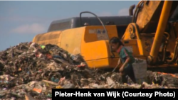 Men, women, and children dig through mountains of trash to earn money by collecting plastic and glass bottles for recycling.