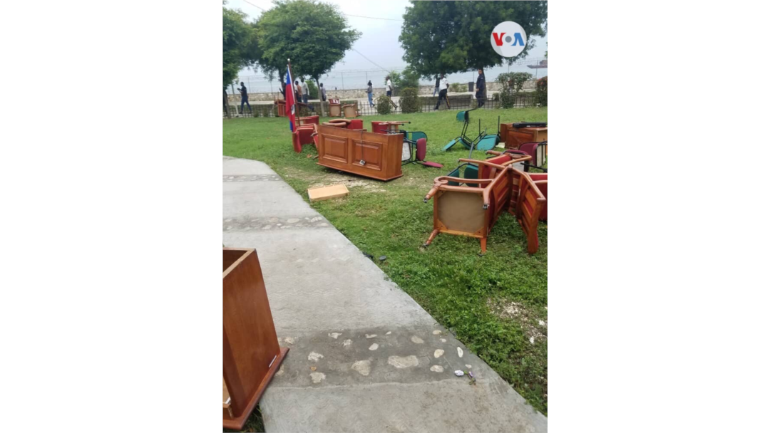 FILE - Furniture litters the ground after being dragged out of the Haitian Senate by opposition senators, May 30, 2019.