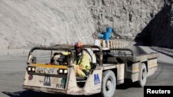 FILE - A worker drives a vehicle at Zimplats' Ngwarati Mine in Mhondoro-Ngezi May 30, 2014.