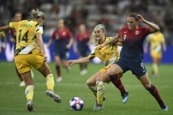 FILE - Norway's forward Isabell Herlovsen, right, vies with Australia's defender Ellie Carpenter, center, during the France 2019 Women's World Cup at the Stade de Nice stadium in Nice, France, June 22, 2019.