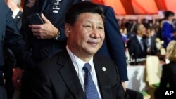 FILE - China's President Xi Jinping attends the opening session at the COP21, United Nations Climate Change Conference, in Le Bourget, outside Paris, Nov. 30, 2015..