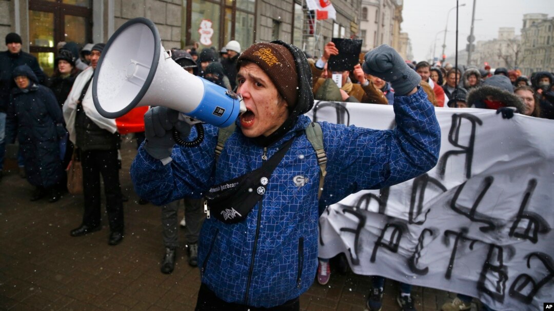 Belarusians shout slogans during a rally in support of sole traders in the city center in Minsk, Belarus, Feb. 28, 2016.