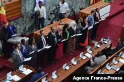 FILE - Ethiopia's newly appointed ministers take their oath of office on Oct. 16, 2018, at the parliament in the capital Addis Ababa.