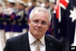 FILE - Australian Prime Minister Scott Morrison is pictured in Tokyo, Nov. 17, 2020.