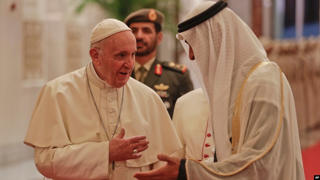 Pope Francis is welcomed by Abu Dhabi's Crown Prince Sheikh Mohammed bin Zayed Al Nahyan, upon his arrival at the Abu Dhabi airport, United Arab Emirates, Feb. 3, 2019.