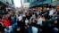 Demonstrators hold placards during a march in central Auckland, New Zealand, June 1. 2020, to protest the death of United States' George Floyd, a black man who died in police custody.