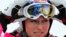 FILE - Overall leader of Alpine Skiing World Cup, Lindsey Vonn of the U.S. takes off her mask at the finish area of the Rosa Khutor Alpine skiing, in Krasnaya Polyana near Sochi, Feb. 19, 2012. 