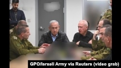 Israeli Prime Minister Benjamin Netanyahu monitors Israel's operation against Iran from the operations center of the Israel Defense Ministry in Tel Aviv, in this image taken from video, Oct. 25, 2024. (GPO/Israeli army via Reuters)