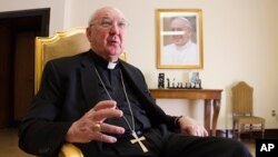 Cardinal Kevin Farrell, head of the Vatican's family and laity office, talks during an interview with The Associated Press in office in Rome, Italy, July 31, 2018. 