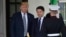 President Donald Trump welcomes Italian Prime Minister Giuseppe Conte, center, to the West Wing in Washington, July 30, 2018.