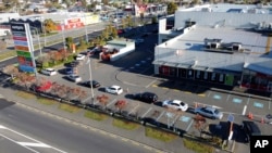 Customers queue at a drive through fast food restaurant as level four COVID-19 restrictions are eased in Christchurch, New Zealand, Tuesday, April 28, 2020.
