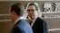 U.S. Treasury Secretary Steven Mnuchin, right, and a U.S. delegation arrive at a hotel in Beijing for trade talks with China, May 3, 2018.