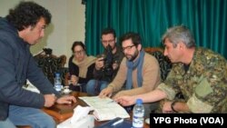 Şandeya HRW ligel YPG kom dibe