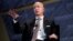 FILE - Jeff Bezos, president and CEO of Amazon and owner of The Washington Post, speaks at the Economic Club of Washington's "Milestone Celebration Dinner" in Washington, Sept. 13, 2018.