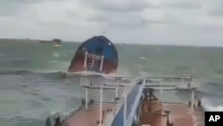 This photo taken from a video released by the Russian Southern Transport Prosecutor's Office, shows a Volgoneft-212 tanker wrecked by a storm in the Kerch Strait, Russia, Dec. 15, 2024. 