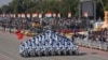 Indian Army's daredevils perform stunts through the ceremonial Kartavya Path during India's Republic Day parade celebrations in New Delhi, Jan. 26, 2025.