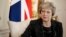 British Prime Minister Theresa May, seen in this July 24, 2018 file photo, has told the BBC in an interview scheduled for broadcast, Sept. 17, 2018, that she gets “irritated” by the debate over her leadership during Brexit negotiations.