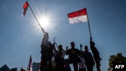 Indonesian activists gather in Surabaya to promote peace in Indonesia's Papua region, Sept. 2, 2019. 