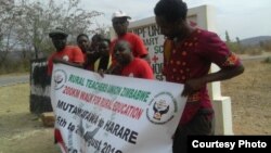 FILE: Rural Teachers Union of Zimbabwe executive members marching from Mutawatawa to Harare.