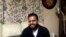 In this Nov. 21, 2017 photo, Irishman Ibrahim Halawa, who was recently acquitted after four years of imprisonment in Egypt, poses for a photograph at his home, in Dublin, Ireland. Halawa says he saw dozens of cellmates radicalize and adopt views of the so-called Islamic State during his brutal captivity in overcrowded jails.