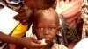 An IDP child takes a dose of oral cholera vaccine at UNMISS Tomping camp in Juba. The World Health Organization says the vaccine is safe for anyone over the age of one year except for pregnant women. 