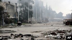 Une rue de Damas, près de la place Abbassiyin le 20 mars 2017, après que des affrontements aient éclaté entre les forces gouvernementales syriennes et les rebelles.