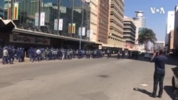 Zimbabwe Police Patrol Empty Street, As Demonstrators Disperse