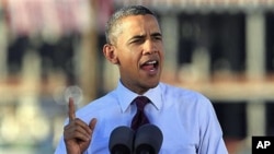 President Barack Obama speaks about manufacturing and jobs during a visit to Intel Corporation's Ocotillo facility in Chandler, Arizona, January 25, 2012.